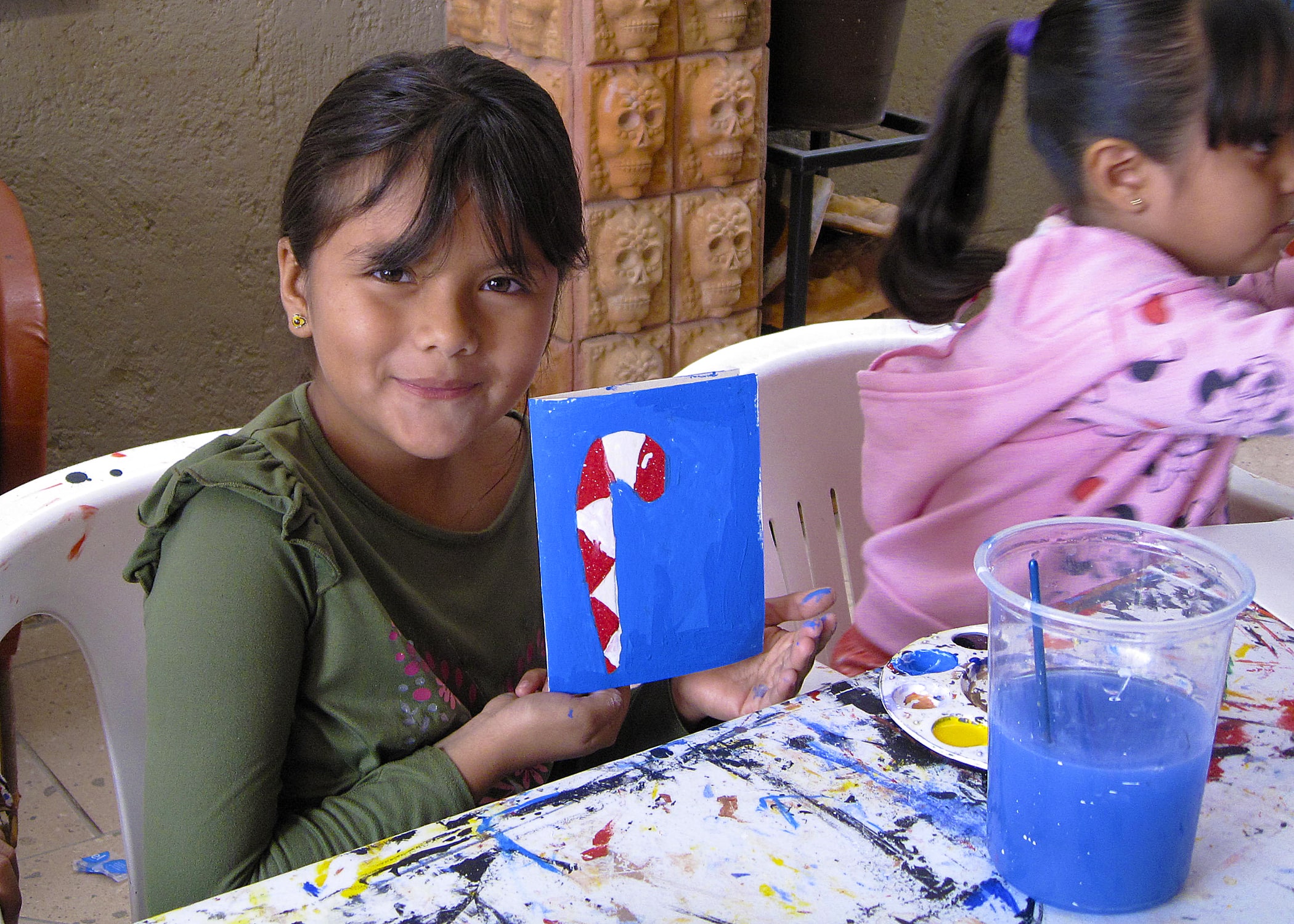 Young artist shows off her Christmas card